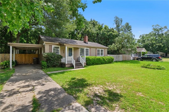 120 Shell Road Pl, Mobile, AL 36607 - view of front of home featuring an attached carport, a chimney, and driveway