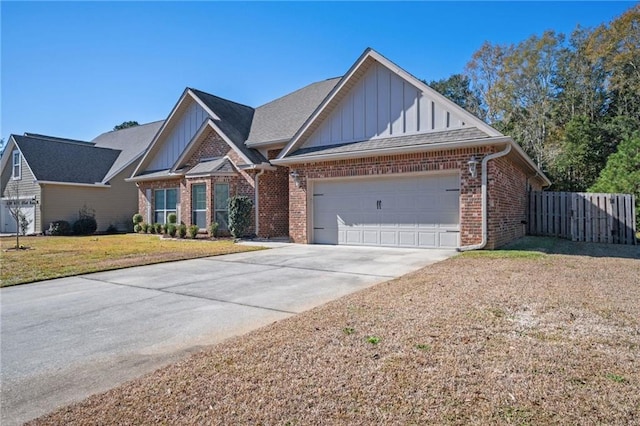 view of front facade with a garage and a front lawn