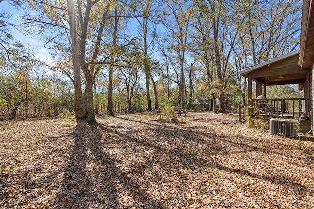 view of yard featuring central AC