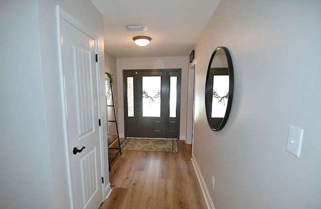 doorway featuring light wood-type flooring