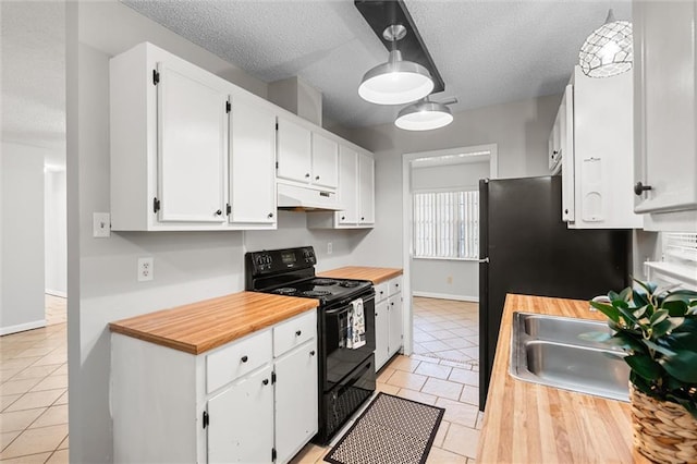 kitchen with sink, white cabinetry, a textured ceiling, light tile patterned floors, and black range with electric stovetop