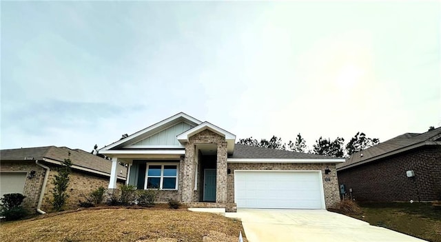 view of front of property with a garage and a front yard