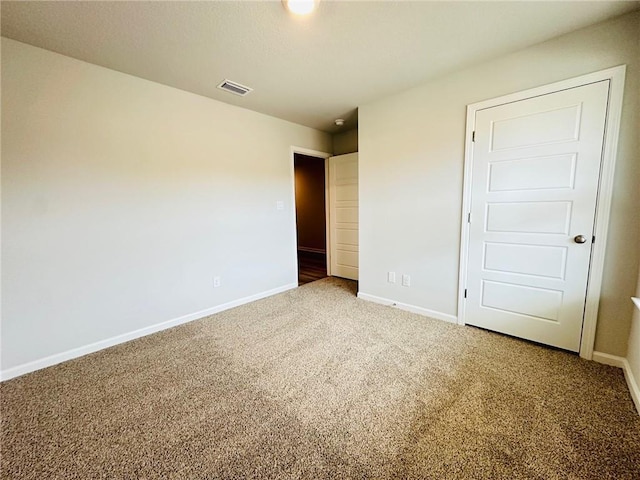 unfurnished bedroom featuring carpet floors