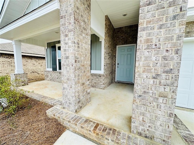 doorway to property with a porch