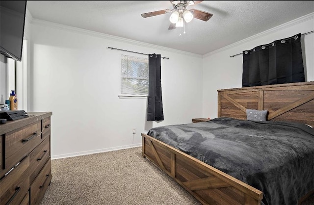 carpeted bedroom with a textured ceiling, ceiling fan, and ornamental molding