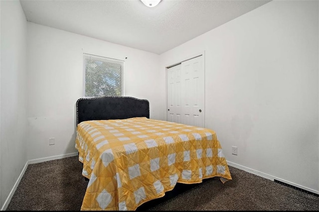 carpeted bedroom with a closet