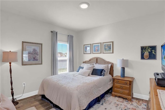 bedroom featuring light wood-type flooring