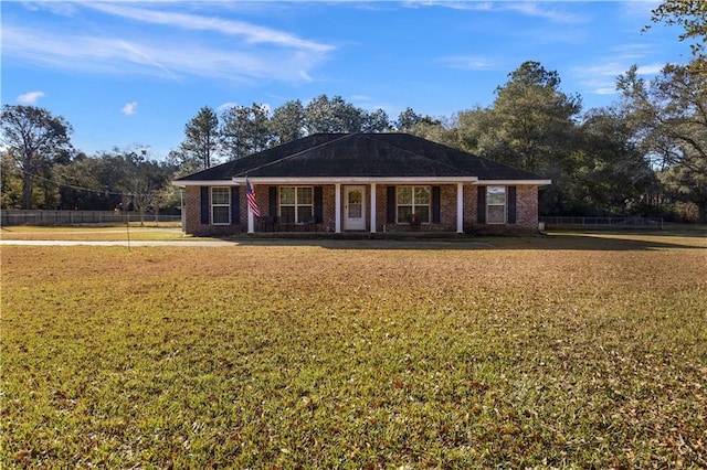 single story home with a front yard