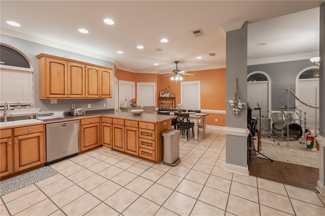 kitchen featuring ceiling fan, dishwasher, sink, crown molding, and light tile patterned flooring