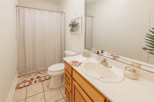 bathroom featuring tile patterned floors, toilet, vanity, and ornamental molding