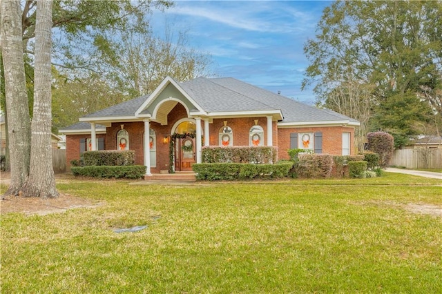 ranch-style house with a front lawn