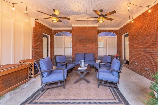 view of patio with ceiling fan and an outdoor hangout area