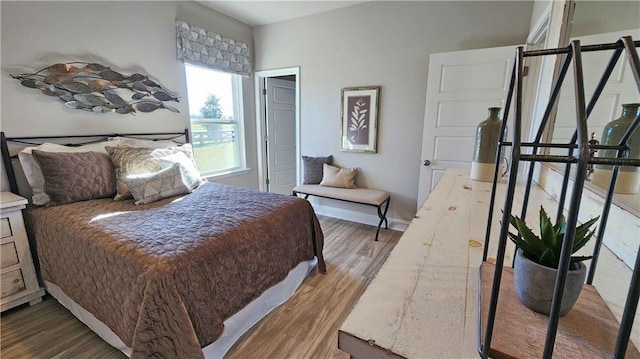 bedroom featuring hardwood / wood-style floors