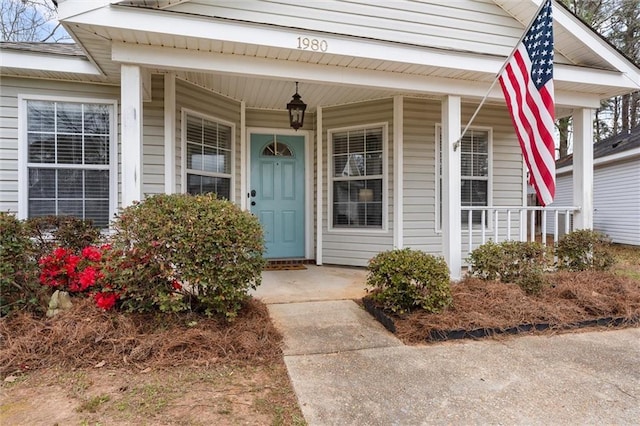 entrance to property with covered porch