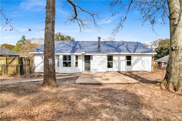 rear view of property with a patio area