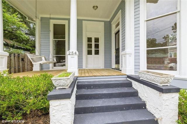 entrance to property with covered porch