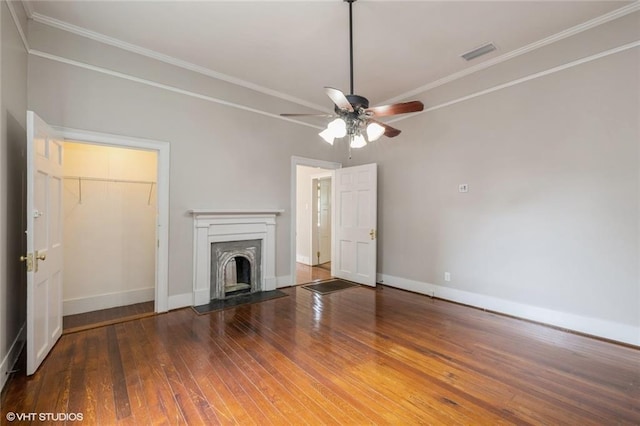 unfurnished living room with ceiling fan, crown molding, and hardwood / wood-style flooring