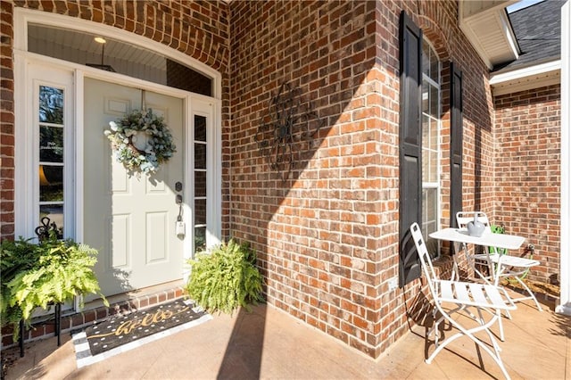 8814 Dawes Lake Rd N, Mobile, AL 36619 - entrance to property with a porch and brick siding