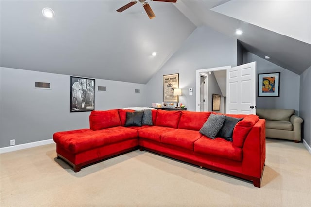 living room with lofted ceiling, light colored carpet, and ceiling fan