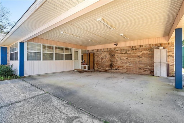 exterior space featuring a carport