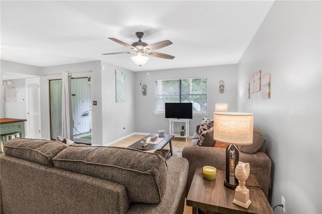 living room with ceiling fan