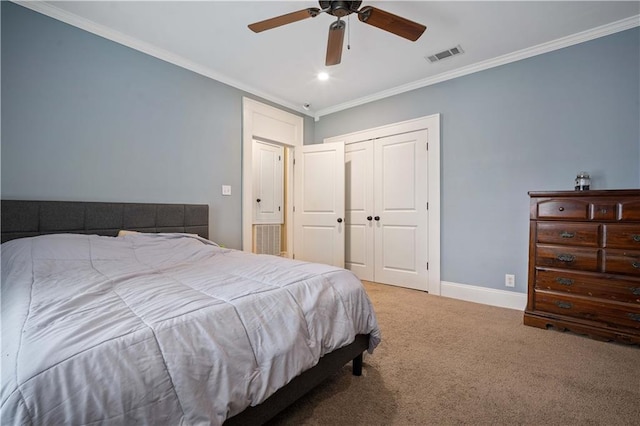 603 Glenwood St, Mobile, AL 36606 - bedroom featuring carpet, ornamental molding, baseboards, recessed lighting, and a closet