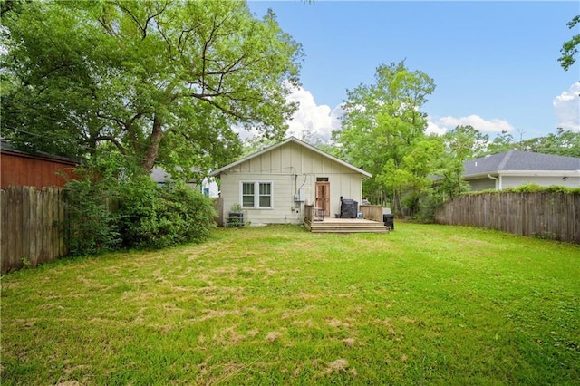 603 Glenwood St, Mobile, AL 36606 - rear view of property featuring board and batten siding and a wooden deck