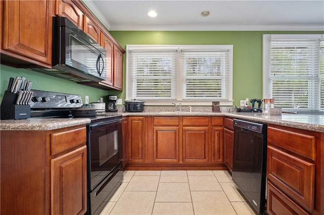 603 Glenwood St, Mobile, AL 36606 - kitchen featuring black appliances, a sink, ornamental molding, light tile patterned floors, and brown cabinets
