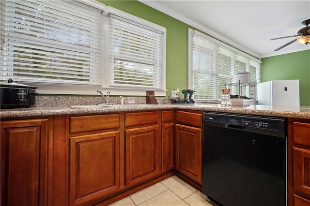603 Glenwood St, Mobile, AL 36606 - kitchen featuring dishwasher, a sink, crown molding, ceiling fan, and light tile patterned floors