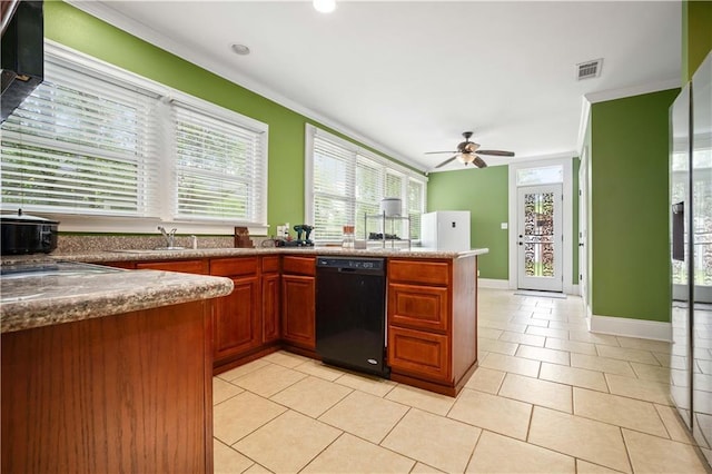 603 Glenwood St, Mobile, AL 36606 - kitchen featuring black dishwasher, ornamental molding, plenty of natural light, a sink, and recessed lighting