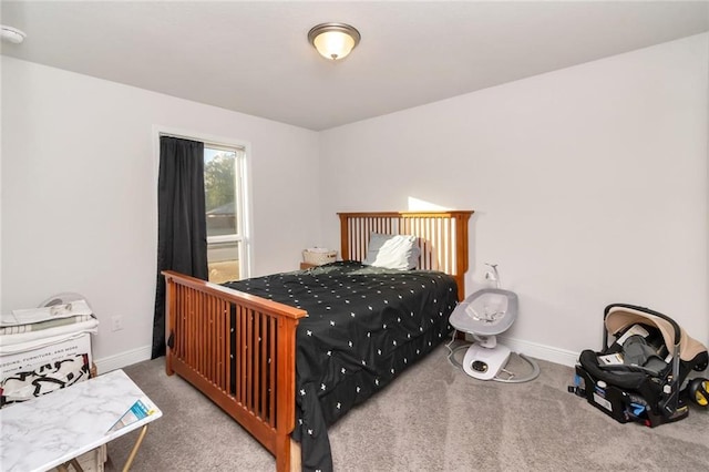 bedroom featuring carpet