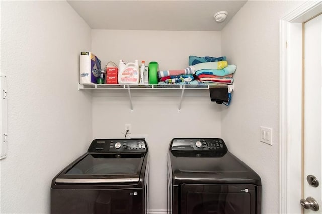 laundry room with washer and clothes dryer