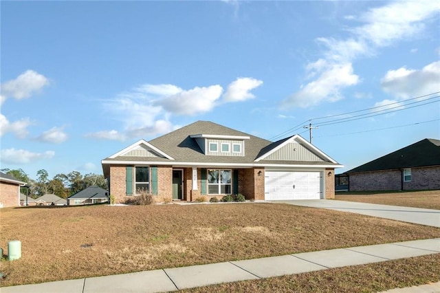 craftsman inspired home with a garage and a front yard