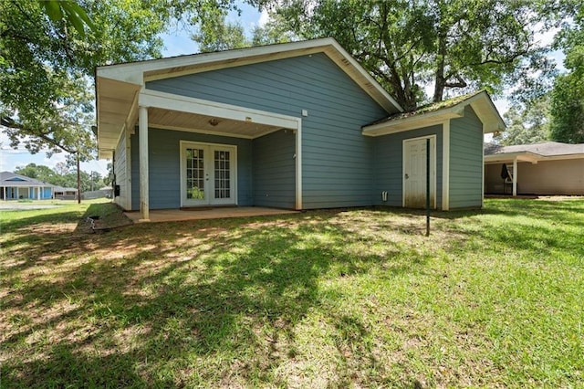 505 Doby Ct, Mobile, AL 36608 - rear view of house with french doors, a lawn, and a patio area