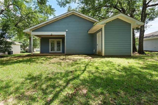 505 Doby Ct, Mobile, AL 36608 - back of property with french doors and a lawn