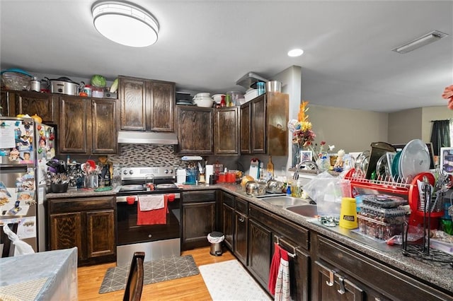 505 Doby Ct, Mobile, AL 36608 - kitchen featuring appliances with stainless steel finishes, under cabinet range hood, dark brown cabinets, light wood-style floors, and recessed lighting