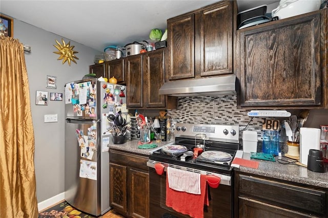 505 Doby Ct, Mobile, AL 36608 - kitchen with appliances with stainless steel finishes, under cabinet range hood, dark brown cabinets, and tasteful backsplash