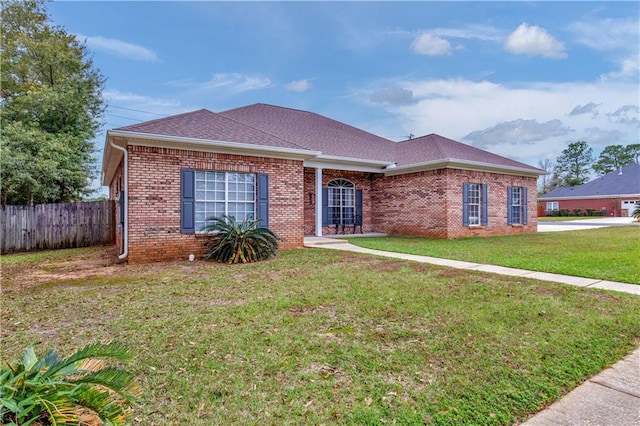 single story home with a front yard