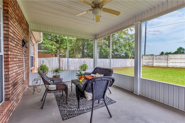 sunroom / solarium with ceiling fan