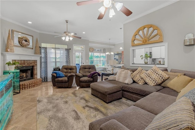 living room with a brick fireplace, ceiling fan, and crown molding