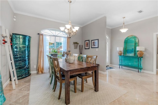 dining area with a chandelier and crown molding