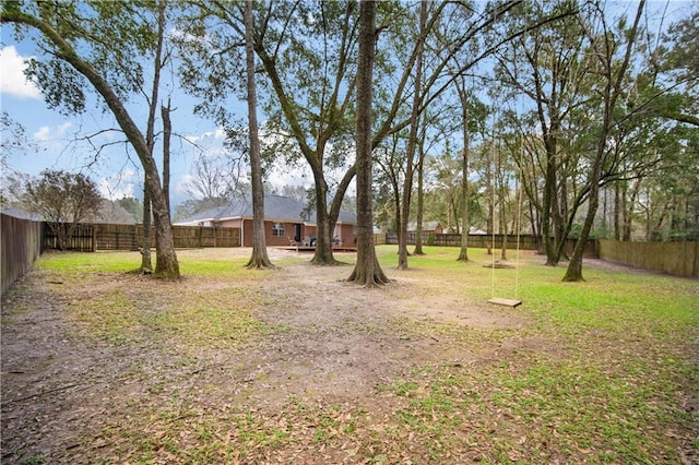 view of yard featuring a fenced backyard