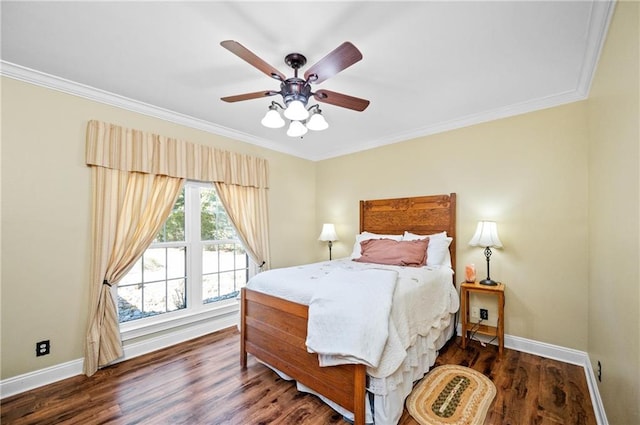 bedroom with ornamental molding, ceiling fan, and dark hardwood / wood-style floors