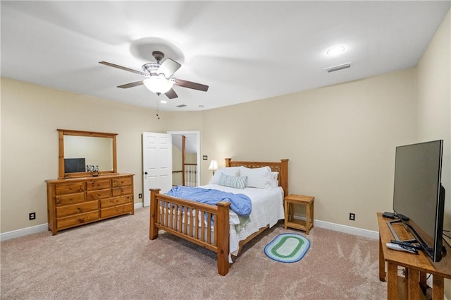 bedroom with light carpet and ceiling fan