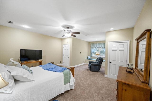 carpeted bedroom featuring ceiling fan