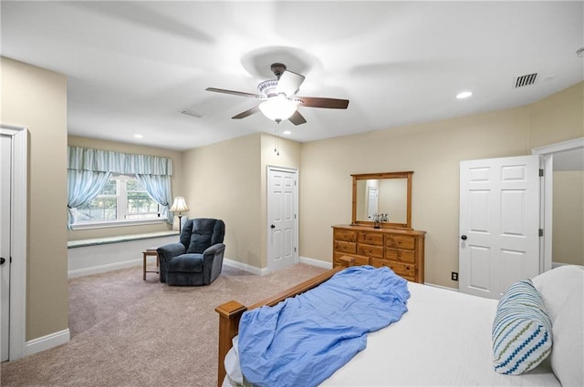 carpeted bedroom featuring ceiling fan