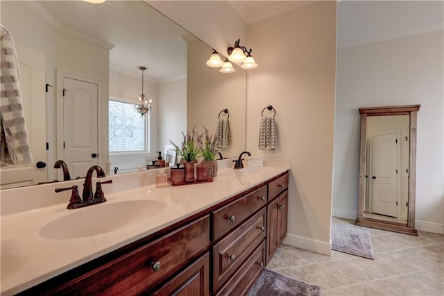 bathroom with tile patterned flooring, ornamental molding, an inviting chandelier, and vanity