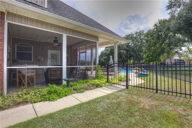 view of yard with ceiling fan