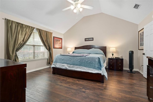 12601 Deer Ridge Dr, Wilmer, AL 36587 - bedroom featuring lofted ceiling, wood finished floors, a fireplace, and ceiling fan