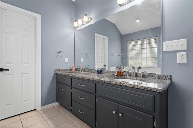 12601 Deer Ridge Dr, Wilmer, AL 36587 - full bath featuring tile patterned flooring, double vanity, and vaulted ceiling